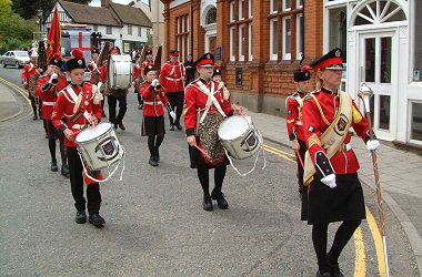 Colourful Marching Band entering Thoroughfare